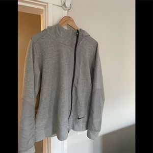 Gray Nike zip up hoodie with pockets